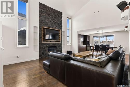 4128 Green Willow Terrace, Regina, SK - Indoor Photo Showing Living Room With Fireplace