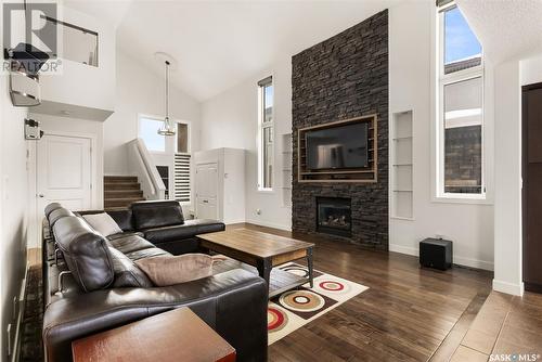 4128 Green Willow Terrace, Regina, SK - Indoor Photo Showing Living Room With Fireplace