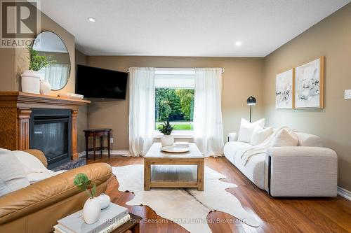 84 Wasaga Sands Drive, Wasaga Beach, ON - Indoor Photo Showing Living Room With Fireplace