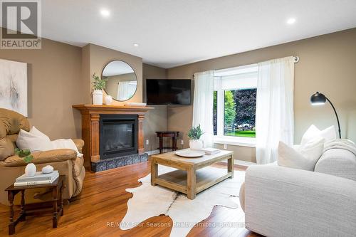 84 Wasaga Sands Drive, Wasaga Beach, ON - Indoor Photo Showing Living Room With Fireplace