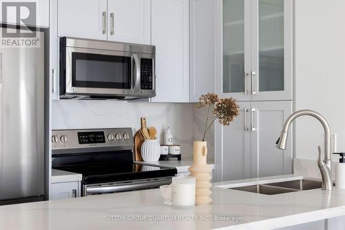 311 - 2495 Dundas Street W, Toronto, ON - Indoor Photo Showing Kitchen With Double Sink With Upgraded Kitchen