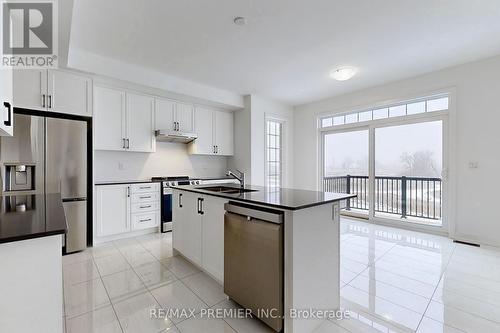 63 Deer Ridge Crescent, Whitby, ON - Indoor Photo Showing Kitchen With Double Sink