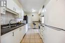 508 - 2835 Islington Avenue E, Toronto, ON  - Indoor Photo Showing Kitchen With Double Sink 