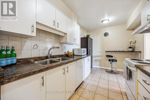 508 - 2835 Islington Avenue E, Toronto, ON - Indoor Photo Showing Kitchen With Double Sink