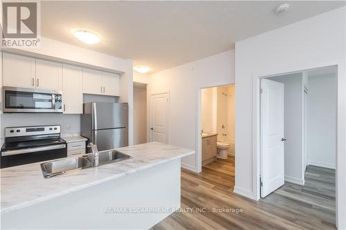 417 - 5055 Greenlane Road, Lincoln, ON - Indoor Photo Showing Kitchen With Stainless Steel Kitchen With Double Sink