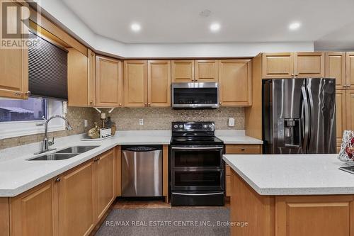 25 Heartview Road, Brampton, ON - Indoor Photo Showing Kitchen With Double Sink