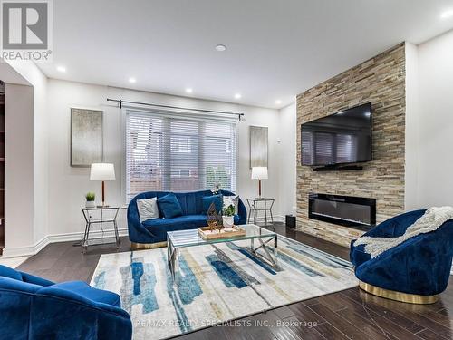 47 Donomore Drive, Brampton, ON - Indoor Photo Showing Living Room With Fireplace