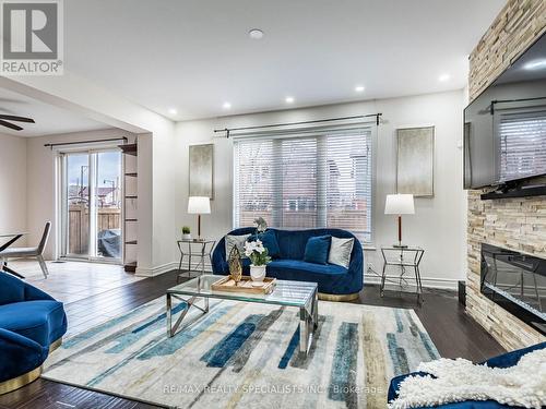 47 Donomore Drive, Brampton, ON - Indoor Photo Showing Living Room With Fireplace