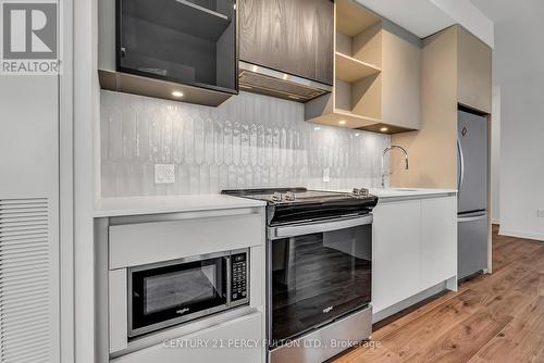 317 - 395 Dundas Street W, Oakville, ON - Indoor Photo Showing Kitchen With Stainless Steel Kitchen With Upgraded Kitchen