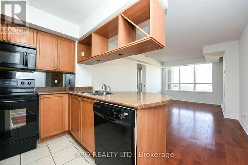 1006 - 4090 Living Arts Drive, Mississauga, ON - Indoor Photo Showing Kitchen With Double Sink