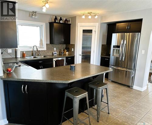 7524 Oxbow Way, Regina, SK - Indoor Photo Showing Kitchen With Double Sink