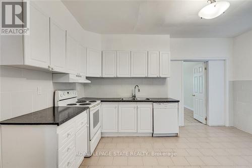 94 Wentworth Street N, Hamilton, ON - Indoor Photo Showing Kitchen With Double Sink