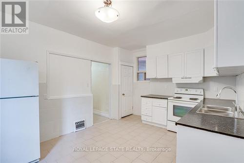 94 Wentworth Street N, Hamilton, ON - Indoor Photo Showing Kitchen With Double Sink