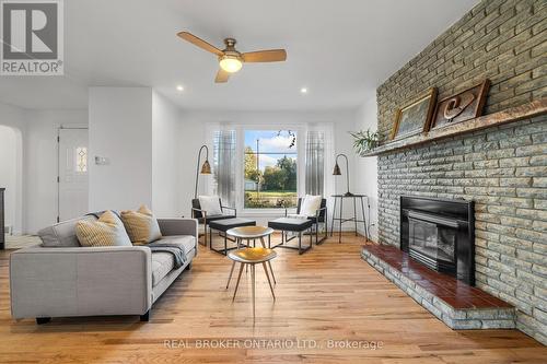 6233 Perth Street, Ottawa, ON - Indoor Photo Showing Living Room With Fireplace