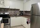 101 - 242 Oakdale Avenue, St. Catharines (456 - Oakdale), ON  - Indoor Photo Showing Kitchen With Double Sink With Upgraded Kitchen 