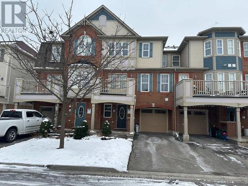 365 Cavanagh Lane, Milton, ON - Outdoor With Balcony With Facade