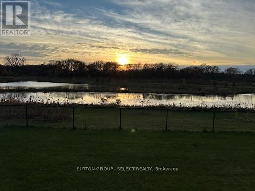 picture-perfect sunset from deck - 123 Foxborough Place, Thames Centre (Thorndale), ON - Outdoor With View