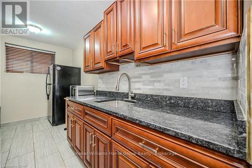 101 - 53 Conroy Crescent, Guelph (College), ON - Indoor Photo Showing Kitchen