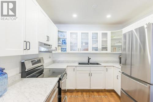 208 - 90 King Street E, Kawartha Lakes, ON - Indoor Photo Showing Kitchen With Stainless Steel Kitchen With Double Sink