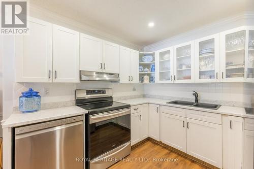 208 - 90 King Street E, Kawartha Lakes, ON - Indoor Photo Showing Kitchen With Double Sink