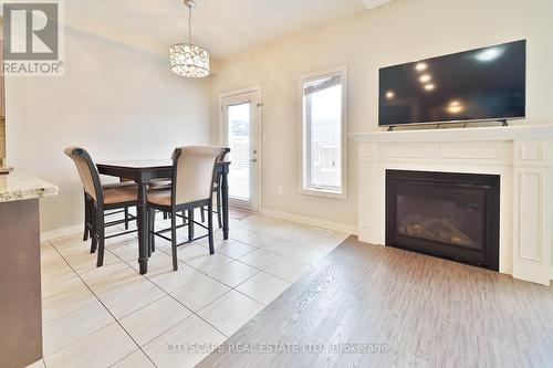 61 Sonoma Valley Crescent, Hamilton, ON - Indoor Photo Showing Other Room With Fireplace