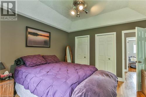 PrimaryBedroom with multiple closets - 46 Hodgins Crescent, Woodstock, ON - Indoor Photo Showing Bedroom