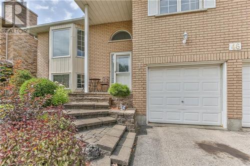 Entrance to property with a garage - 46 Hodgins Crescent, Woodstock, ON - Outdoor