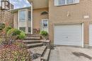 Entrance to property with a garage - 46 Hodgins Crescent, Woodstock, ON  - Outdoor 