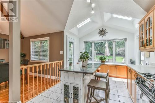 Kitchen featuring a kitchen bar and a healthy amount of sunlight - 46 Hodgins Crescent, Woodstock, ON - Indoor