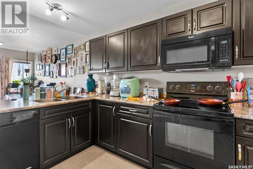 330 100 Chaparral Boulevard, Martensville, SK - Indoor Photo Showing Kitchen With Double Sink