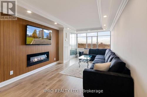 1101 - 3100 Kirwin Avenue, Mississauga, ON - Indoor Photo Showing Living Room With Fireplace