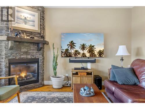 338 Prestwick Lane, Kelowna, BC - Indoor Photo Showing Living Room With Fireplace