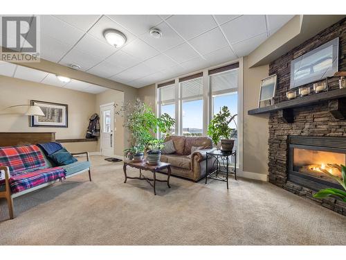 338 Prestwick Lane, Kelowna, BC - Indoor Photo Showing Living Room With Fireplace