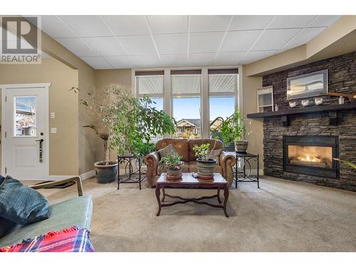 338 Prestwick Lane, Kelowna, BC - Indoor Photo Showing Living Room With Fireplace