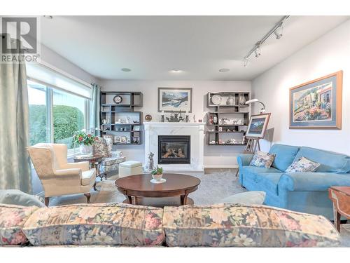 2365 Stillingfleet Road Unit# 71 Lot# 133, Kelowna, BC - Indoor Photo Showing Living Room With Fireplace