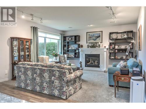 2365 Stillingfleet Road Unit# 71 Lot# 133, Kelowna, BC - Indoor Photo Showing Living Room With Fireplace