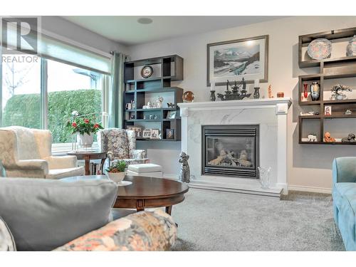 2365 Stillingfleet Road Unit# 71 Lot# 133, Kelowna, BC - Indoor Photo Showing Living Room With Fireplace