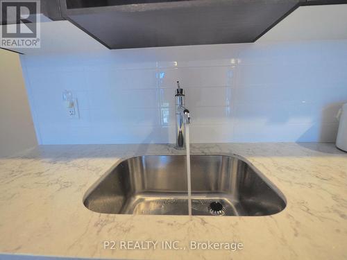 306 - 225 Village Green Square, Toronto, ON - Indoor Photo Showing Kitchen With Double Sink