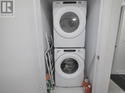 306 - 225 Village Green Square, Toronto, ON - Indoor Photo Showing Laundry Room