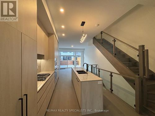 50 - 40 Lou Parsons Way, Mississauga, ON - Indoor Photo Showing Kitchen With Double Sink