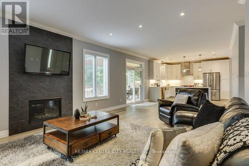 75 Caverhill Crescent, Middlesex Centre (Komoka), ON - Indoor Photo Showing Living Room With Fireplace