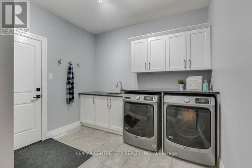 75 Caverhill Crescent, Middlesex Centre (Komoka), ON - Indoor Photo Showing Laundry Room