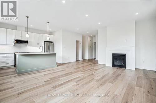 1 - 29 Cyclone Way, Fort Erie (337 - Crystal Beach), ON - Indoor Photo Showing Kitchen With Upgraded Kitchen