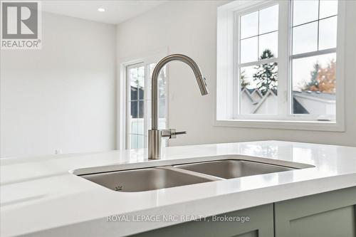 1 - 29 Cyclone Way, Fort Erie (337 - Crystal Beach), ON - Indoor Photo Showing Kitchen With Double Sink