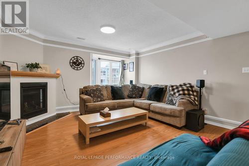 1105 Gablefield Pvt Crescent E, Ottawa, ON - Indoor Photo Showing Living Room With Fireplace