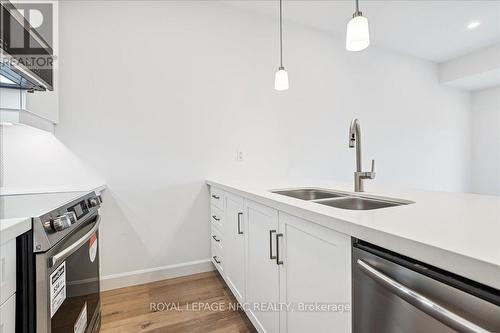 2 - 29 Cyclone Way, Fort Erie (337 - Crystal Beach), ON - Indoor Photo Showing Kitchen With Stainless Steel Kitchen With Double Sink