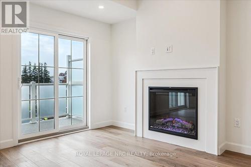 2 - 29 Cyclone Way, Fort Erie (337 - Crystal Beach), ON - Indoor With Fireplace