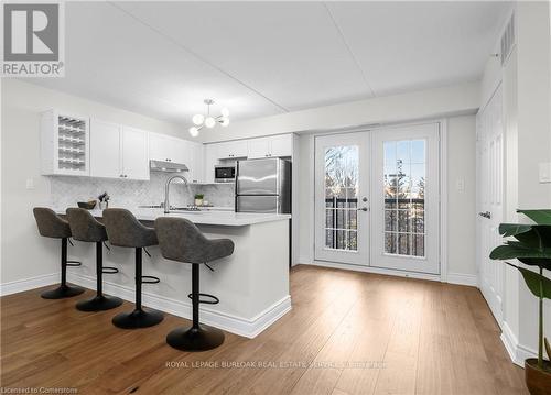 210 - 2055 Appleby Line, Burlington, ON - Indoor Photo Showing Kitchen With Upgraded Kitchen