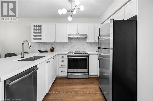 210 - 2055 Appleby Line, Burlington, ON - Indoor Photo Showing Kitchen With Upgraded Kitchen