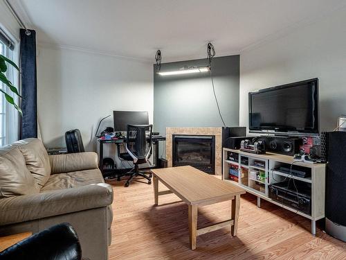 Salon - 1208-C-677 12E Avenue N., Sherbrooke (Fleurimont), QC - Indoor Photo Showing Living Room With Fireplace